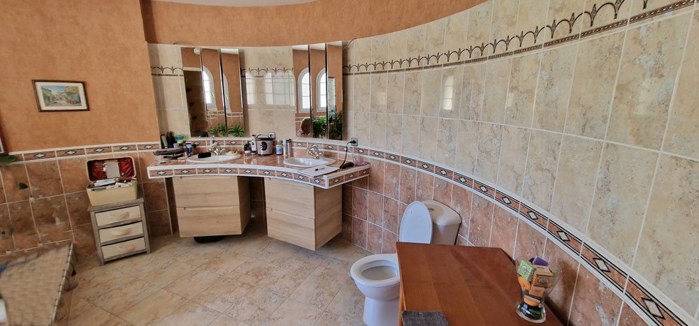Rénovation complète : une maison transformée par le design et l’harmonie - Image avant 2